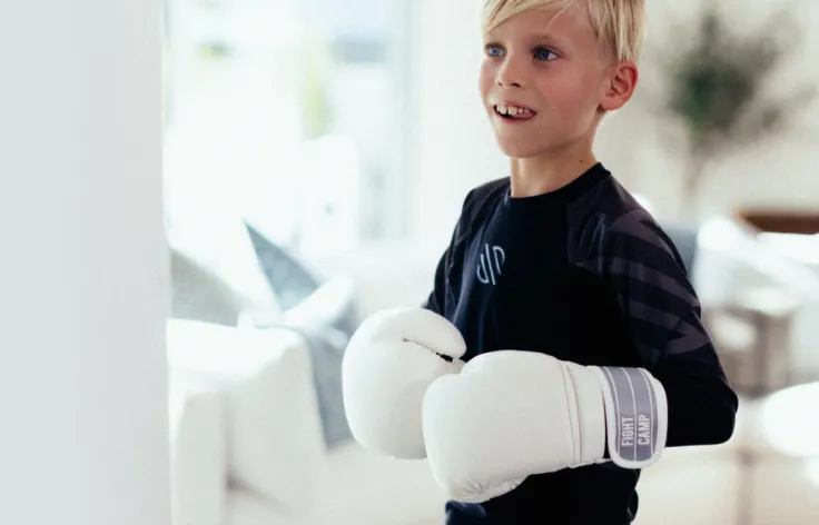 Boy with kid gloves
